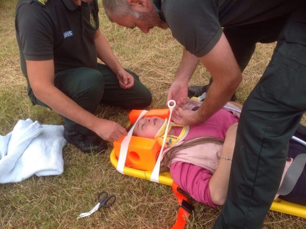 Girl being treated by paramedics