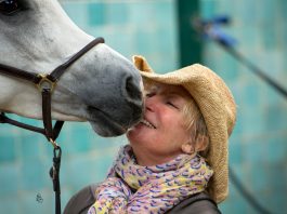 Shirley Watts kissing an Arabian horse
