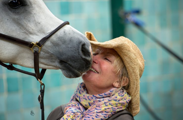 Shirley Watts kissing an Arabian horse
